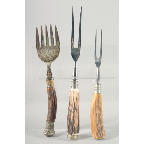 7 - THREE VARIOUS ANTLER HANDLE FORKS.