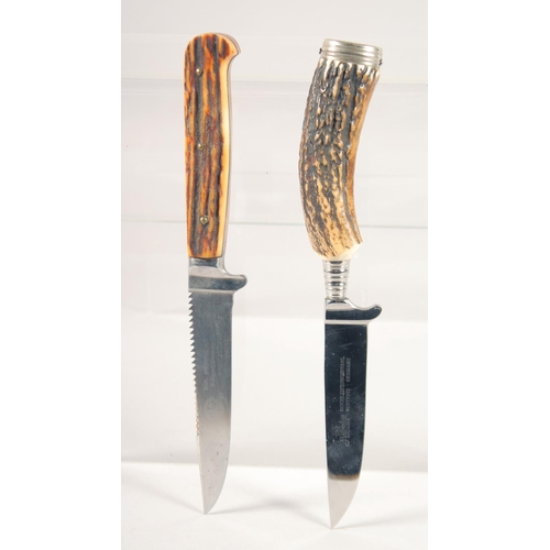 70 - A HUBERTUS SOLINGEN KNIFE, and another, both with antler handles, 8.5