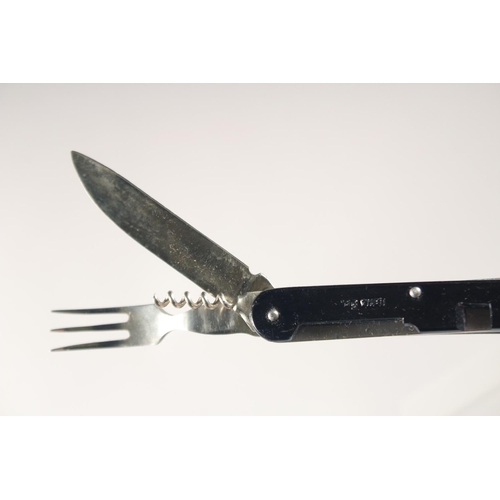 78 - A TRAVELLING FOLDING KNIFE, FORK, AND SPOON, 4.5