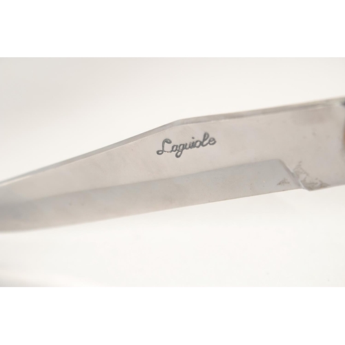 82 - A LAGUIOLE FOLDING KNIFE, with brass and wooden handle, 7