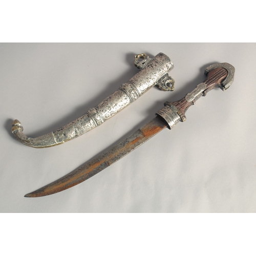 231 - A 19TH CENTURY MOROCCAN KAMAYA SILVER MOUNTED DAGGER, and scabbard, 41cm long.