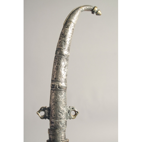 231 - A 19TH CENTURY MOROCCAN KAMAYA SILVER MOUNTED DAGGER, and scabbard, 41cm long.