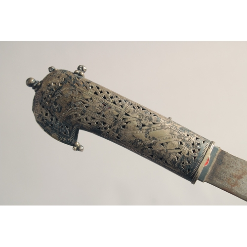 233 - A LATE 19TH CENTURY ARAB - POSSIBLY YEMENI KNIFE, with openworked handle, 33cm long.