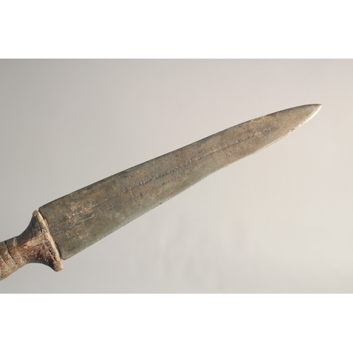 234 - A 19TH CENTURY INDIAN DAGGER, together with two European daggers, one with rhino horn handle, and an... 