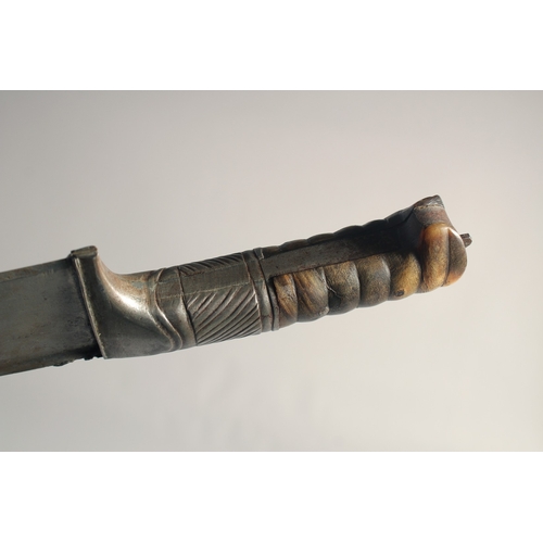 236 - A 19TH CENTURY AFRICAN KHYBER KNIFE, with buffalo horn hilt and leather overlaid scabbard, knife 66c... 