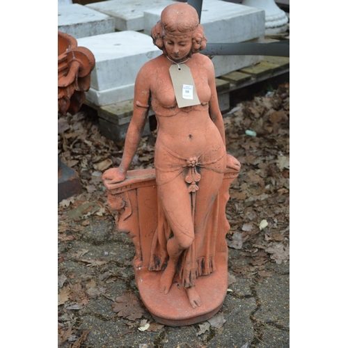 10 - A terracotta coloured garden sculpture of a classical standing female figure.