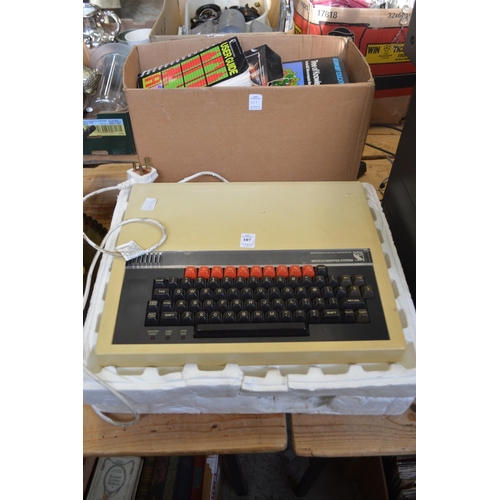 107 - A BBC micro computer system and associated books.