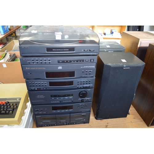 108 - A Sony stacking Hi-Fi system with pair of speakers.