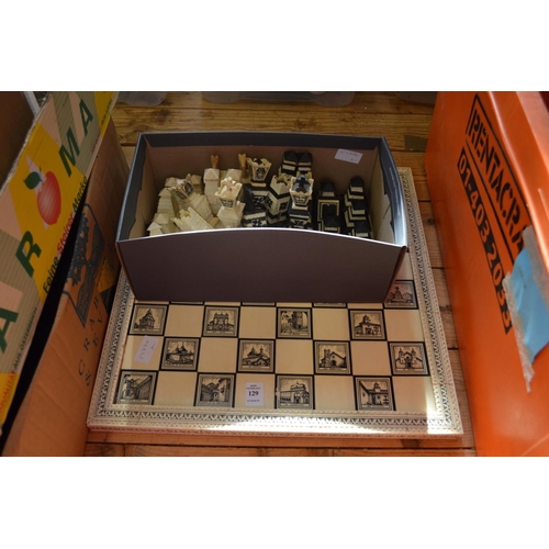 129 - Chess set and pieces.