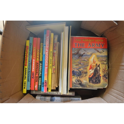 138 - A box of childrens annuals etc.