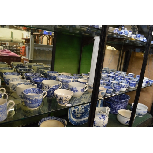 170 - A large quantity of blue and white cups and mugs.