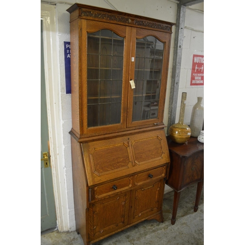 190 - An oak bureau bookcase.