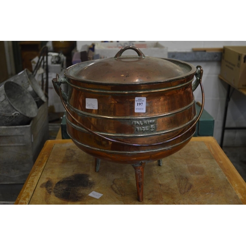 197 - A heavy cast metal cauldron style cooking pot with lid, marked Falkirk size 5.