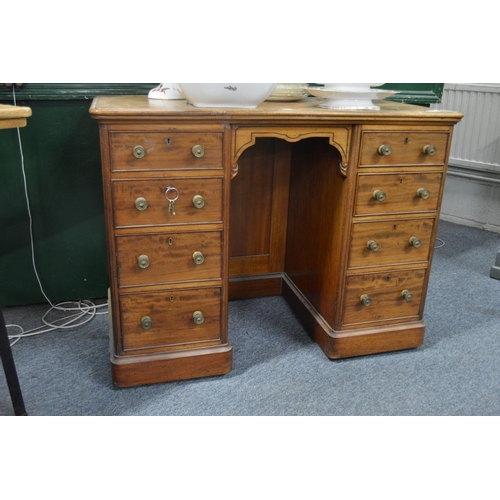 221 - A good Georgian style mahogany kneehole pedestal desk.