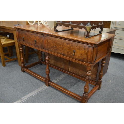 248 - A walnut two drawer serving table.