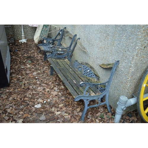 26 - A garden bench and pair of matching armchairs (as found).