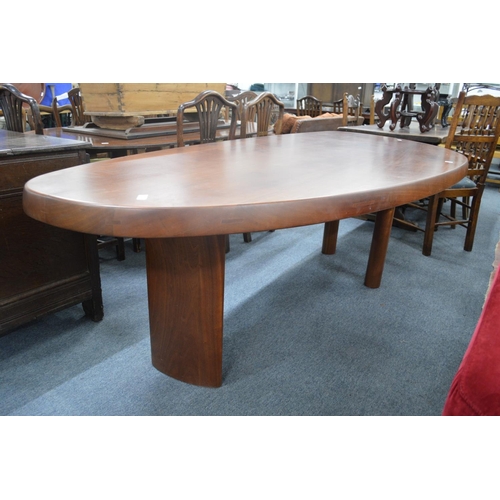 262 - A large heavy and unusual shape top dining table on column supports, overall size 7'9