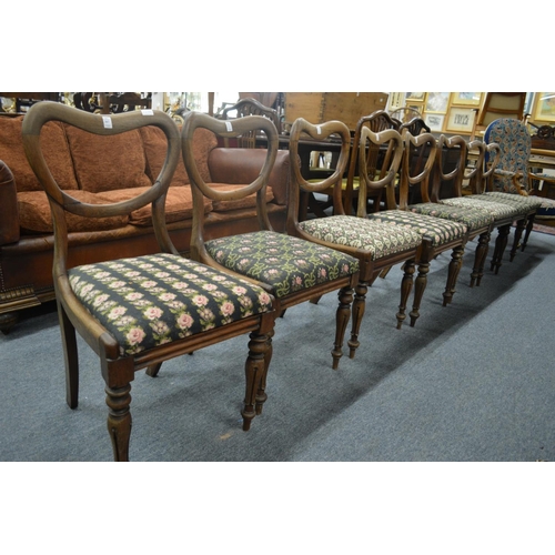 267 - A good set of eight William IV rosewood kidney back dining chairs with individually needlework uphol... 