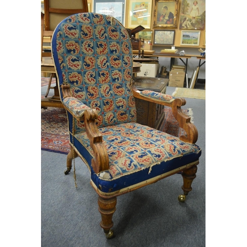 268 - A 19th century walnut framed and tapestry upholstered open armchair.