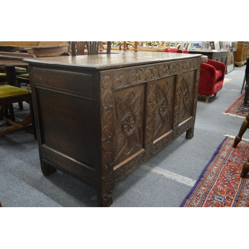 269 - A large 18th century oak coffer.