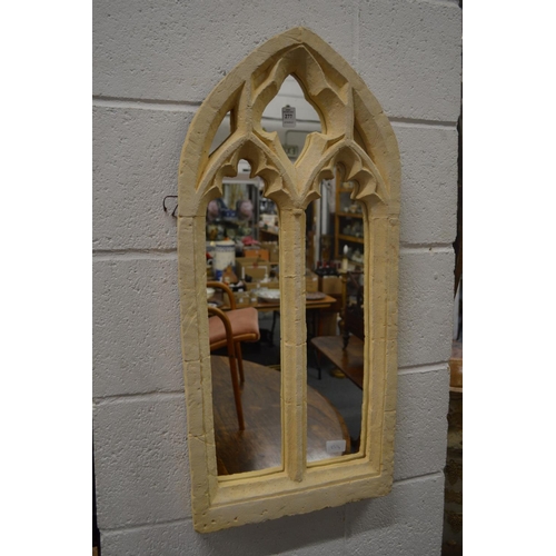 277 - A good gothic style arch shaped mirror modelled as a stone window.