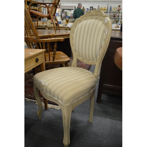 280 - A pair of painted and upholstered single chairs.