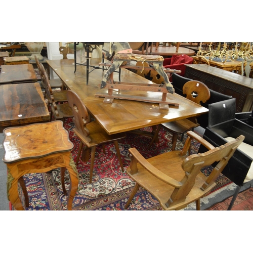 286 - An unusual Swiss walnut refectory style drawer leaf dining table together with a set of ten dining c... 