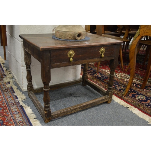 293 - An early oak single drawer side table (reduced in height).