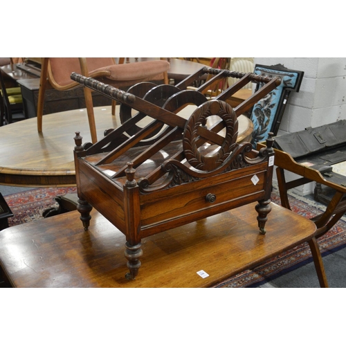 297 - An early 19th century rosewood three division canterbury with a single drawer on turned feet with br... 