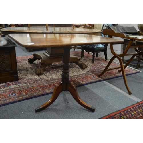 298 - A 19th century mahogany tilt-top tripod table.