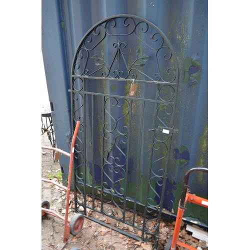 30 - A wrought iron arch shaped gate 5' 5.5