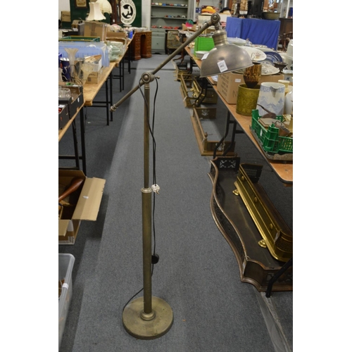 302 - A floor standing adjustable reading lamp.