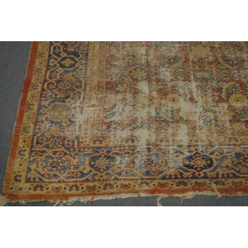 307 - An old Persian carpet, worn 9' 6