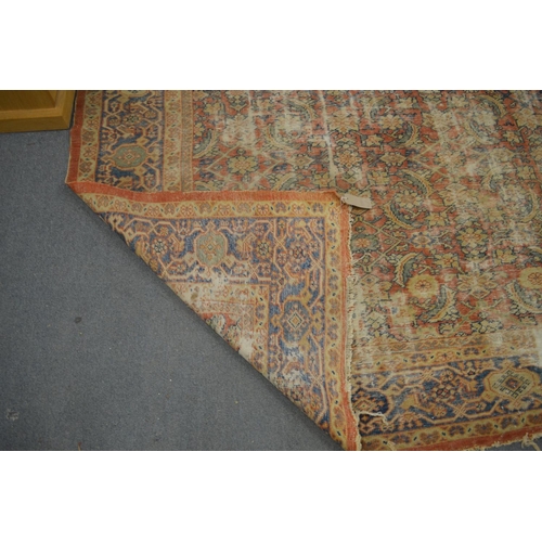 307 - An old Persian carpet, worn 9' 6