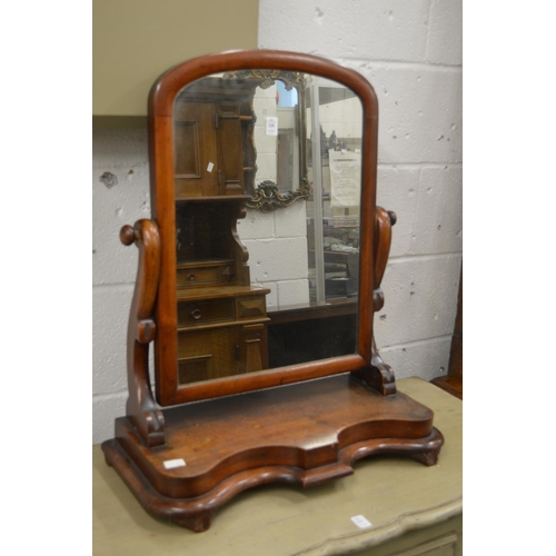 320 - A Victorian mahogany dressing table mirror.