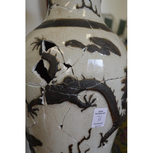 36 - A large pair of Chinese pottery vase lamps (faults).