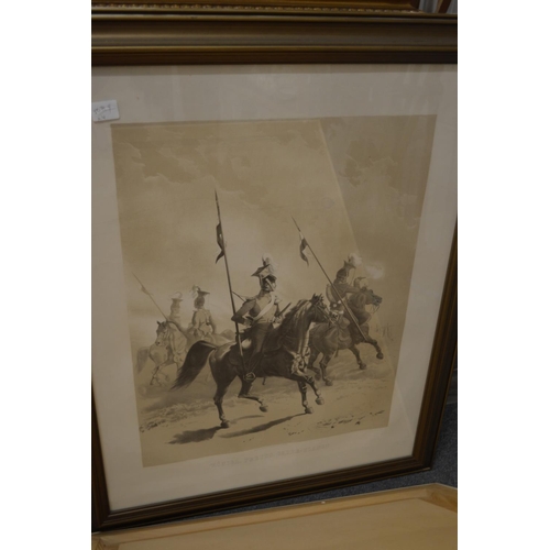 372 - A set of four black and white prints depicting military figures on horseback.