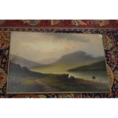 400 - Late 19th century English School, a mountainous landscape with loch, oil on canvas, relined but unfr... 