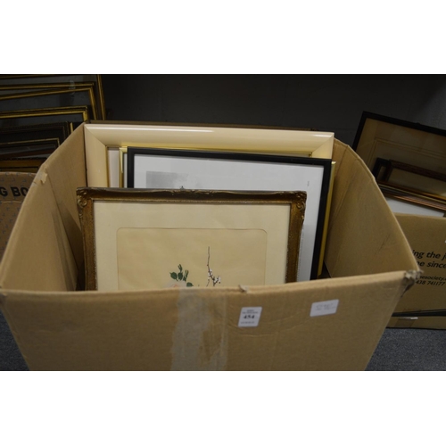 454 - A box of paintings and prints etc.