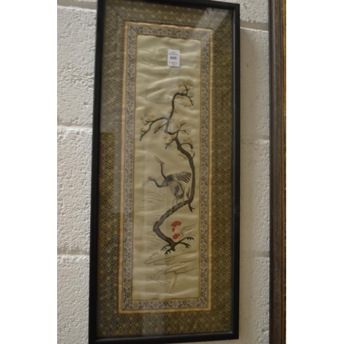 460 - A pair of Chinese embroidered pictures depicting birds on branches.