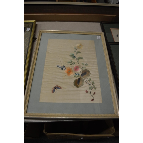 462 - A set of three Chinese embroidered pictures depicting birds, insects and flowers.