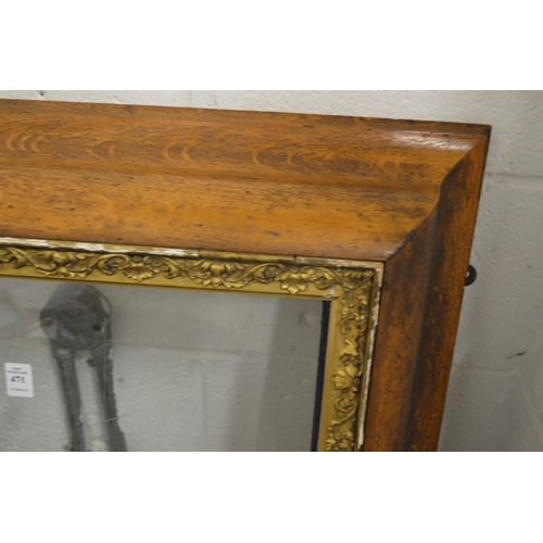 471 - A large unusual moulded oak and gilded frame.