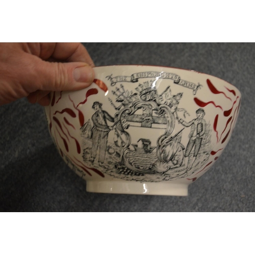 496 - A large lustre ware bowl decorated with the ship Caroline and the Ship Wrights Arms.