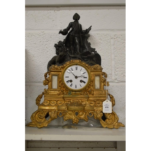 498 - Decorative figural mantel clock.