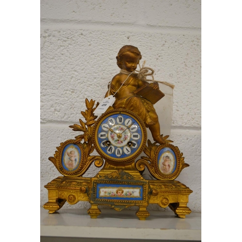 499 - A French spelter mantel clock with porcelain panels.