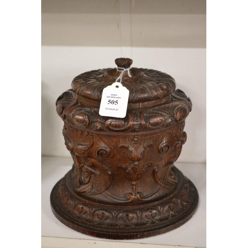 505 - A good carved oak cigar or tobacco jar.