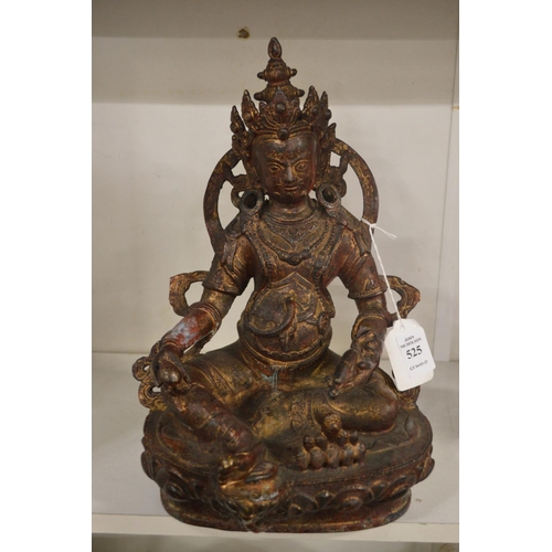 525 - A good cast bronze figure of a seated Chinese deity.