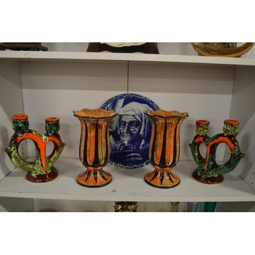 535 - A pair of lustre glazed vases, a pair of unusual candlesticks and a blue and white plate.