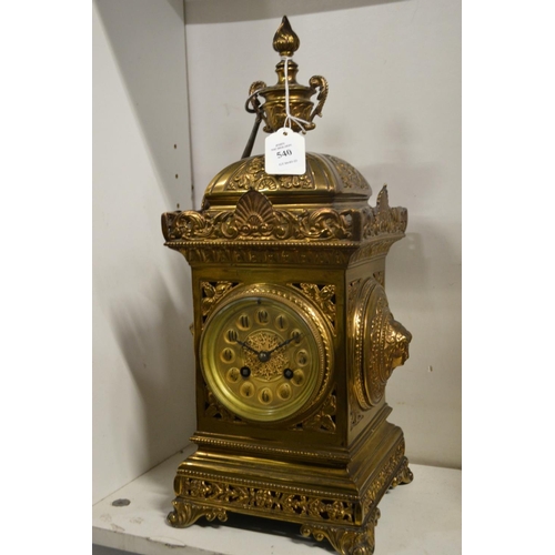 540 - A decorative brass mantel clock.