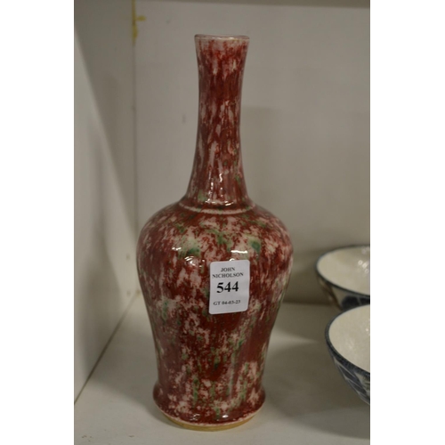 544 - A Chinese red and green speckle vase.